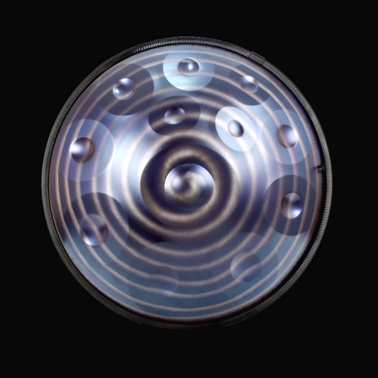 a circular metal object with a black background