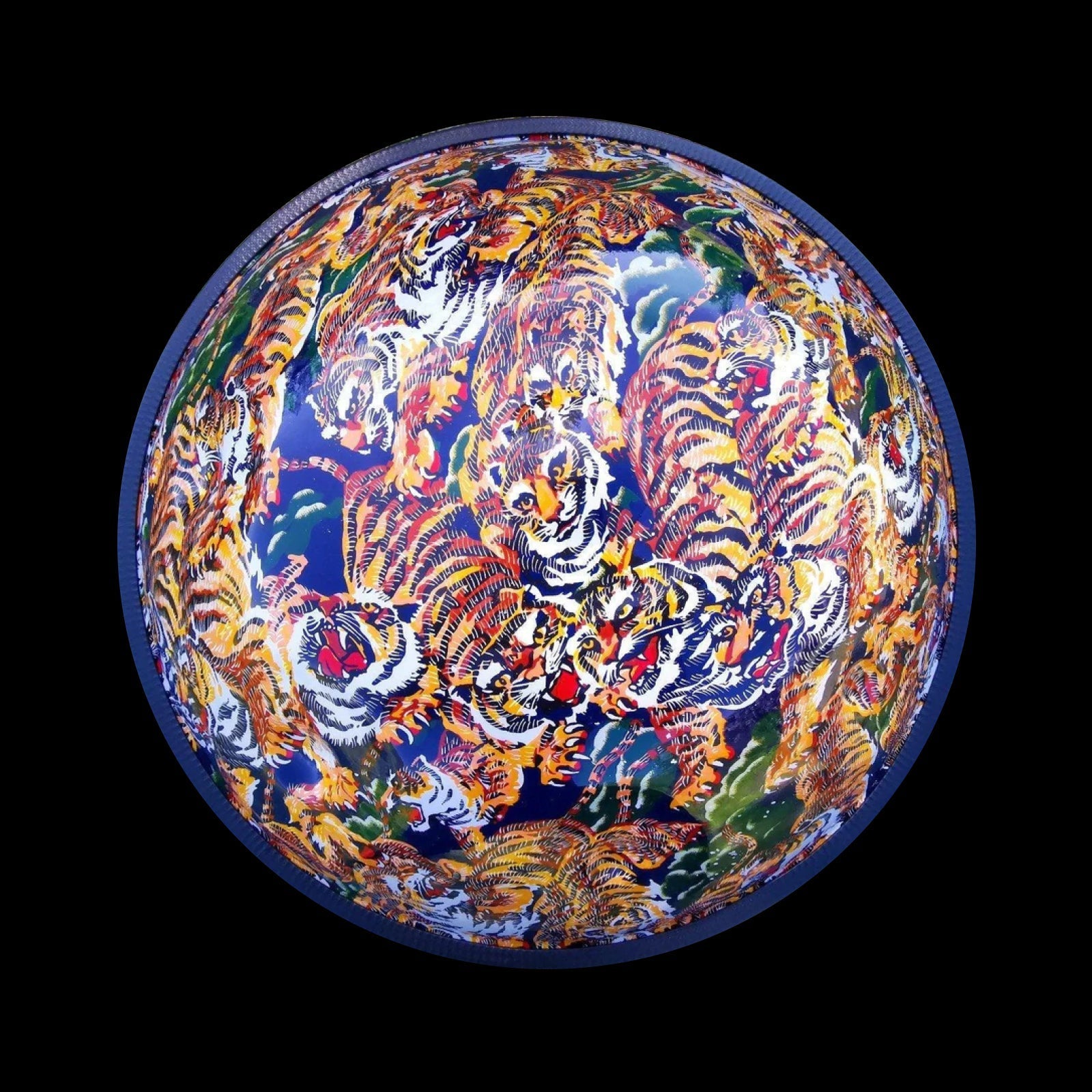 a colorful bowl with tigers painted on it