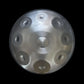 a round metal object with holes in it