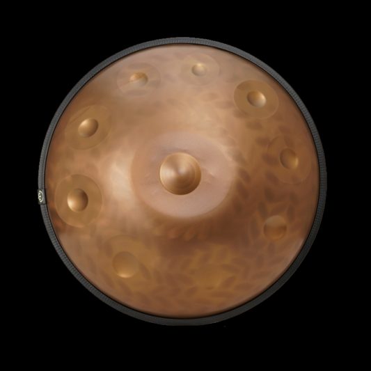 a close up of a gong on a black background