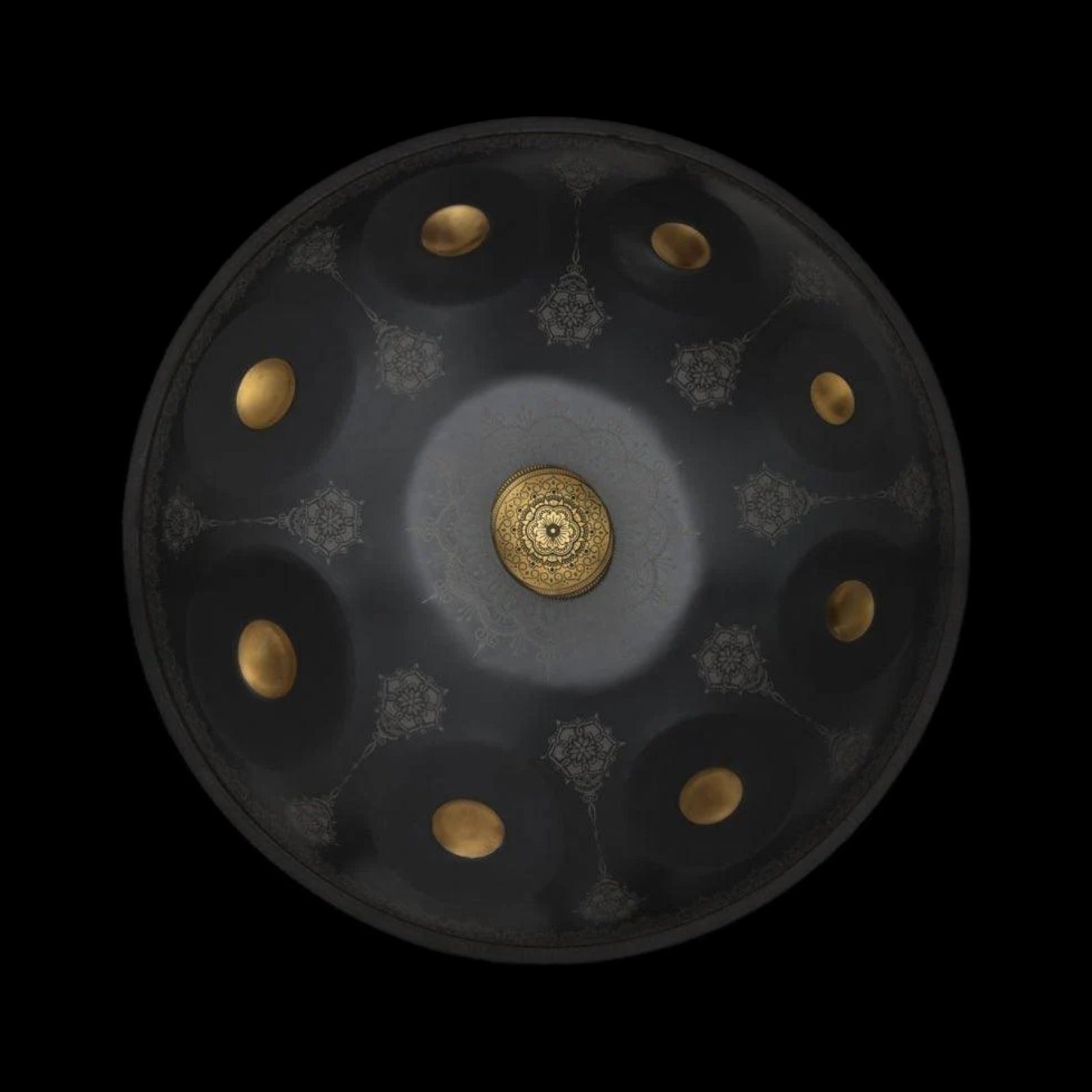 a black and gold plate with gold dots