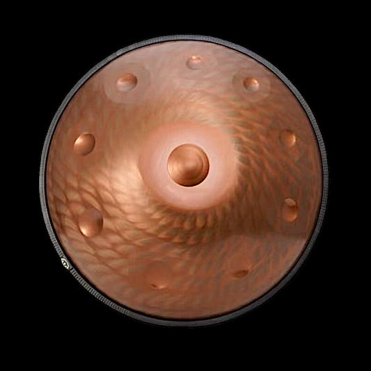 a close up of a gong on a black background